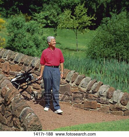 Stock Photo - people, walking, golf, senior, outdoors. Fotosearch