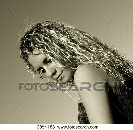 Stock Image - people, woman, blond, beauty, indoors, monochromatic. Fotosearch
