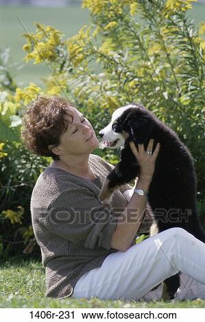 people, woman, dog, ground, puppy, sitting, pet View Large Photo Image Stock Image - people, woman, dog, ground, puppy, sitting, pet. Fotosearch