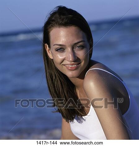 people, woman, ocean, beach, brunette View Large Photo Image Picture - people, woman, ocean, beach, brunette. Fotosearch