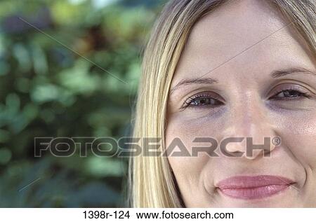 people, woman, outdoors, blond, headshot, Caucasian View Large Photo Image Picture - people, woman, outdoors, blond, headshot, Caucasian. Fotosearch