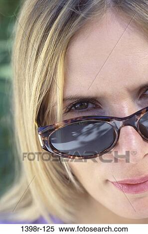 people, woman, sunglasses, outdoors, blond, headshot View Large Photo Image Stock Photography - people, woman, sunglasses, outdoors, blond, headshot. Fotosearch