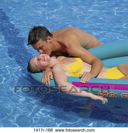 relaxed, people, swim, floating, water, pool, couple View Large Photo Image Stock Photo - relaxed, people, swim, floating, water, pool, couple. Fotosearch