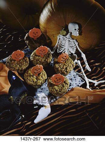 skeleton, festive, Halloween, decorations, desserts, food, still life View Large Photo Image Stock Photo - skeleton, festive, Halloween, decorations, desserts, food, still life. Fotosearch