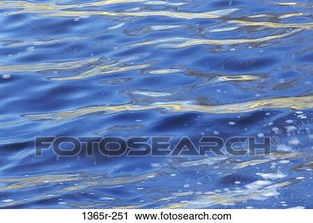 Stock Image - water, ripples, nature, background, wet, reflective. Fotosearch