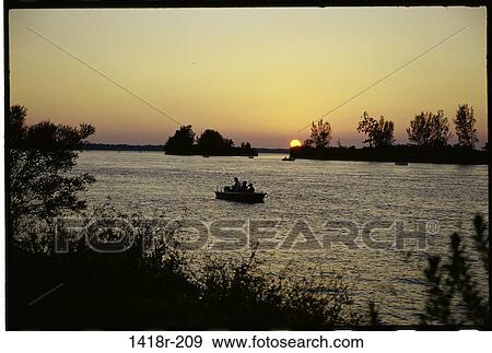 water, sunset, beach, silhouette, boating, nature View Large Photo Image Stock Photo - water, sunset, beach, silhouette, boating, nature. Fotosearch
