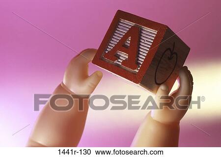 block, doll, holding, education, still life, toy View Large Photo Image Stock Image - block, doll, holding, education, still life, toy. Fotosearch