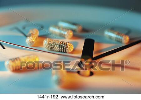 Stock Image - blur, clock, industry, health, medicine, still life. Fotosearch