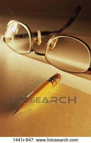 Stock Photo - blur, glasses, pencil, business, still life, Business still lifes various. Fotosearch