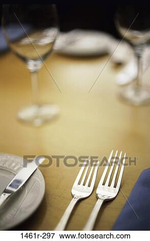 Stock Photo - blur, glasses, table, place, stemware, wineglasses, silverware. Fotosearch