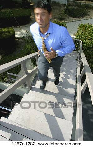 blur, stairs, running, rush, Hispanic, business View Large Photo Image Stock Image - blur, stairs, running, rush, Hispanic, business. Fotosearch