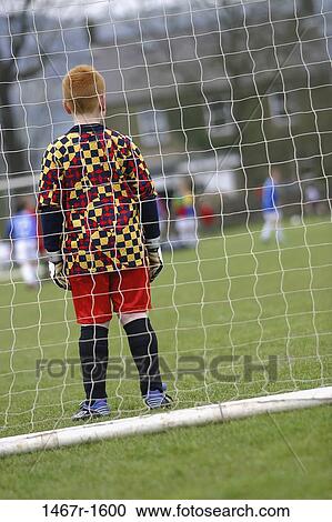 boy, outdoors, sports, net, child, soccer View Large Photo Image Stock Image - boy, outdoors, sports, net, child, soccer. Fotosearch