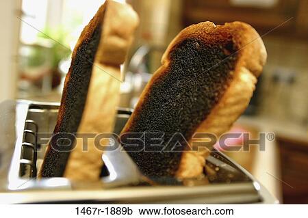 Stock Image - bread, breakfast, appliance, toast, food, kitchen, still life. Fotosearch