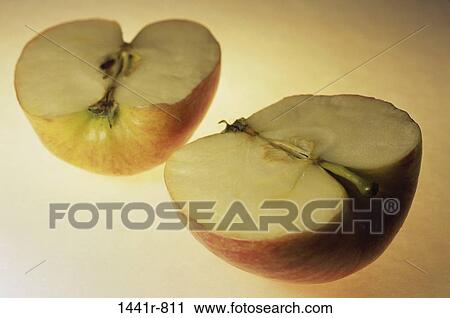 Stock Image - cut, fruit, still life, food, sliced, apple. Fotosearch