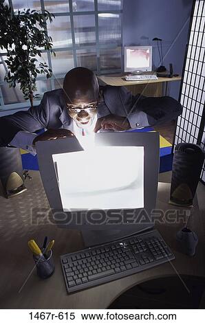 Stock Photography - desk, keyboard, monitor, glasses, open. Fotosearch