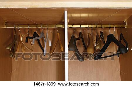 empty, still life, closet, housewares, hangers, clothes hanger View Large Photo Image Stock Photo - empty, still life, closet, housewares, hangers, clothes hanger. Fotosearch