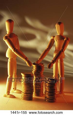 finance, still life, coins, financial, dolls, figurines View Large Photo Image Stock Photography - finance, still life, coins, financial, dolls, figurines. Fotosearch