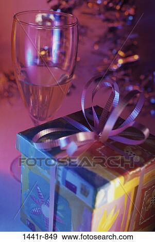 glass, wine, champagne, festive, gift, present, ribbon View Large Photo Image Stock Photo - glass, wine, champagne, festive, gift, present, ribbon. Fotosearch