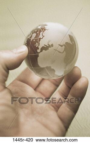 hand, glass, world, globe, holding, leadership, power View Large Photo Image Stock Image - hand, glass, world, globe, holding, leadership, power. Fotosearch