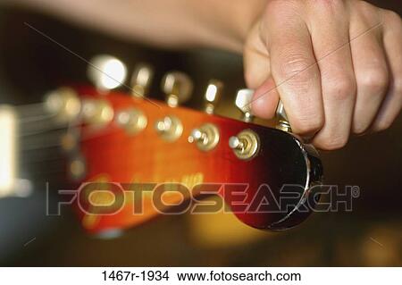 hand, music, guitar, arts, entertainment, detail View Large Photo Image Picture - hand, music, guitar, arts, entertainment, detail. Fotosearch