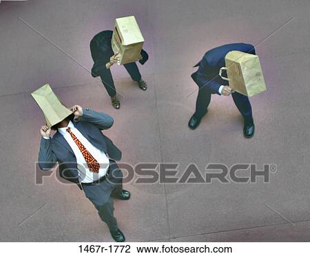 Stock Image - hiding, business, bags, paper bags, businessmen, metaphor. Fotosearch
