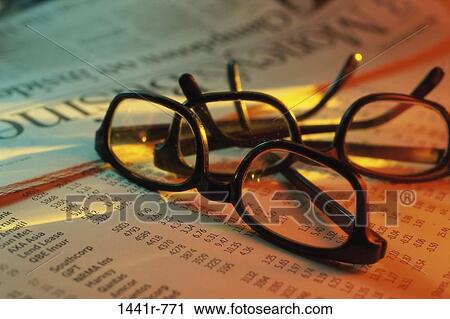 Stock Image - industry, newspaper, eyeglasses, market, finance, stock market. Fotosearch