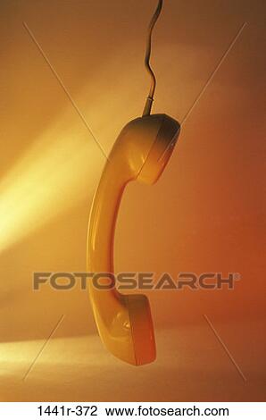 Stock Image - industry, telephone, hanging, yellow, phone, receiver. Fotosearch