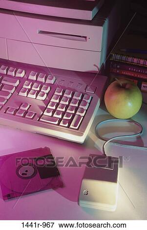 Stock Photo - keyboard, mouse, apple, computer, fruit, education, food. Fotosearch