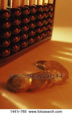 Stock Photography - money, abacus, finance, still life, coins, currency. Fotosearch