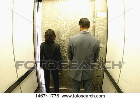 multiethnic, people, business, waiting, indoors, elevator View Large Photo Image Stock Photograph - multiethnic, people, business, waiting, indoors, elevator. Fotosearch