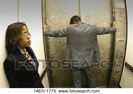 multiethnic, people, business, waiting, indoors, elevator View Large Photo Image Stock Photography - multiethnic, people, business, waiting, indoors, elevator. Fotosearch
