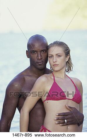 multiethnic, people, couple, beach, standing, serious, stand View Large Photo Image Stock Photography - multiethnic, people, couple, beach, standing, serious, stand. Fotosearch