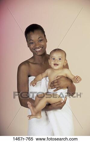 multiethnic, people, diaper, smiling, mother, baby, holding View Large Photo Image Stock Photography - multiethnic, people, diaper, smiling, mother, baby, holding. Fotosearch