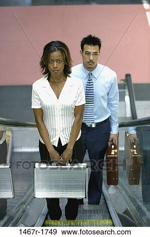 multiethnic, people, escalator, briefcase, business, indoors View Large Photo Image Stock Photo - multiethnic, people, escalator, briefcase, business, indoors. Fotosearch
