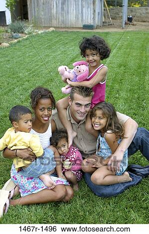 multiethnic, people, ground, outdoors, family, posing, yard View Large Photo Image Stock Photograph - multiethnic, people, ground, outdoors, family, posing, yard. Fotosearch