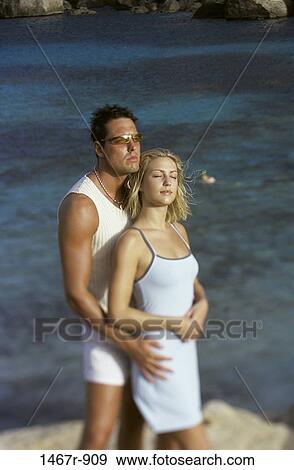 multiethnic, people, reflection, water, couple, beach, sunglasses View Large Photo Image Stock Photo - multiethnic, people, reflection, water, couple, beach, sunglasses. Fotosearch