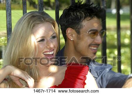 multiethnic, people, smiling, railing, couple, outdoors View Large Photo Image Picture - multiethnic, people, smiling, railing, couple, outdoors. Fotosearch