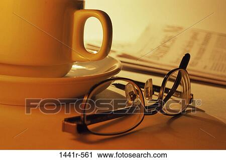 newspaper, eyeglasses, business, still life, cup, monochromatic View Large Photo Image Stock Image - newspaper, eyeglasses, business, still life, cup, monochromatic. Fotosearch