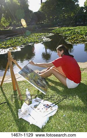 outdoors, woman, artist, creative, painting, arts, art View Large Photo Image Stock Photo - outdoors, woman, artist, creative, painting, arts, art. Fotosearch