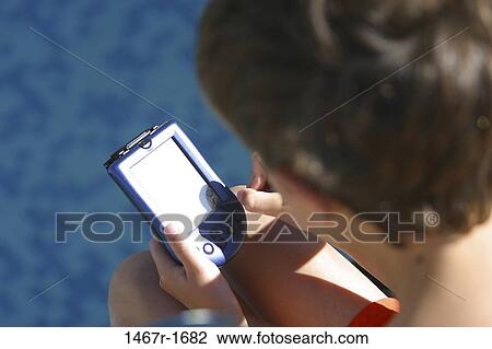 overhead, people, watch, holding, boy, outdoors, entertainment View Large Photo Image Stock Image - overhead, people, watch, holding, boy, outdoors, entertainment. Fotosearch