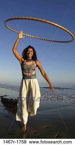people, balance, woman, Hispanic, beach, tide, exercise View Large Photo Image Stock Photo - people, balance, woman, Hispanic, beach, tide, exercise. Fotosearch