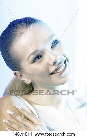 Stock Image - people, blond, contemplating, indoors, teenager. Fotosearch