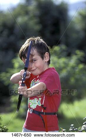 people, boy, outdoors, child, mischievous, brunette, bow View Large Photo Image Stock Image - people, boy, outdoors, child, mischievous, brunette, bow. Fotosearch