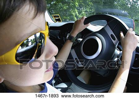people, car, driving, sunglasses, outdoors, transportation View Large Photo Image Stock Image - people, car, driving, sunglasses, outdoors, transportation. Fotosearch
