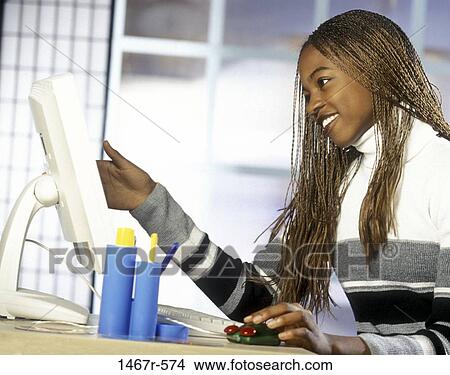 people, desk, woman, computer, brunette View Large Photo Image Picture - people, desk, woman, computer, brunette. Fotosearch