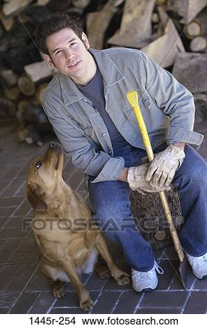 people, dog, pet, outdoors, gazing, ax View Large Photo Image Picture - people, dog, pet, outdoors, gazing, ax. Fotosearch
