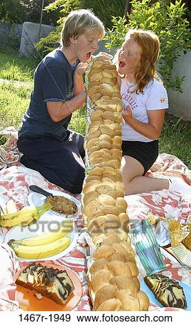 people, eating, couple, picnic, date, food, teens View Large Photo Image Stock Photo - people, eating, couple, picnic, date, food, teens. Fotosearch