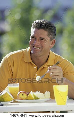 people, eating, fruit, breakfast, outdoors, Middle-aged View Large Photo Image Stock Image - people, eating, fruit, breakfast, outdoors, Middle-aged. Fotosearch