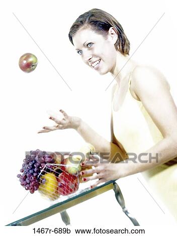 people, eating, grapes, woman, healthy, apple, fruit View Large Photo Image Stock Image - people, eating, grapes, woman, healthy, apple, fruit. Fotosearch