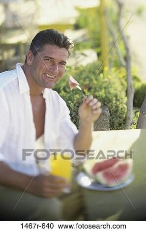 people, eating, watermelon, breakfast, outdoors, Middle-aged View Large Photo Image Stock Image - people, eating, watermelon, breakfast, outdoors, Middle-aged. Fotosearch